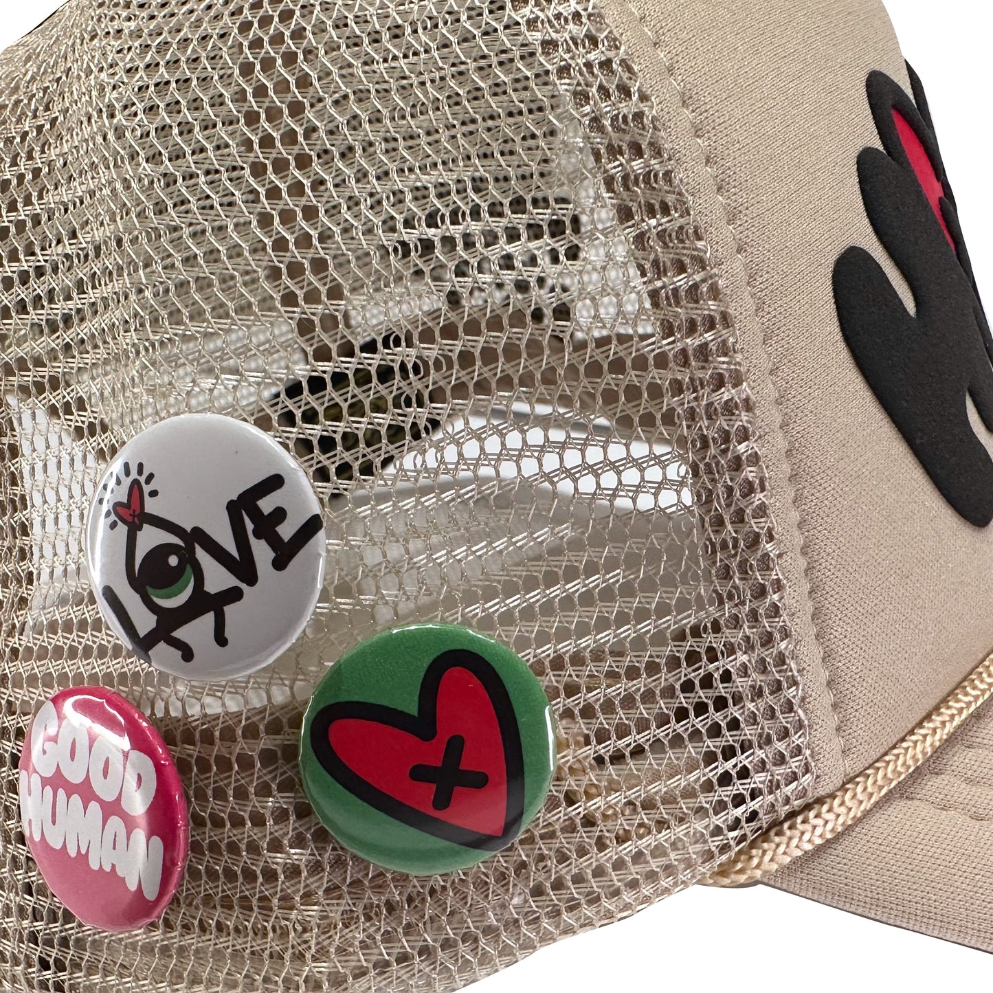 Loveville “H❤️MAN” Trucker Hat – Tan