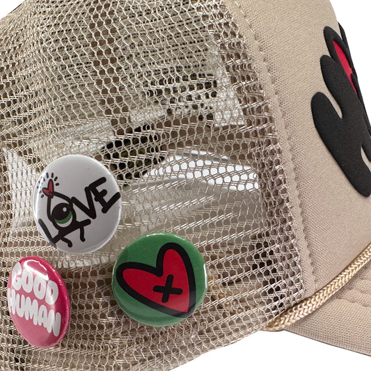 Loveville “H❤️MAN” Trucker Hat – Tan